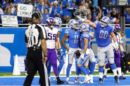 Lions center Graham Glasgow celebrates a touchdown against the Vikings